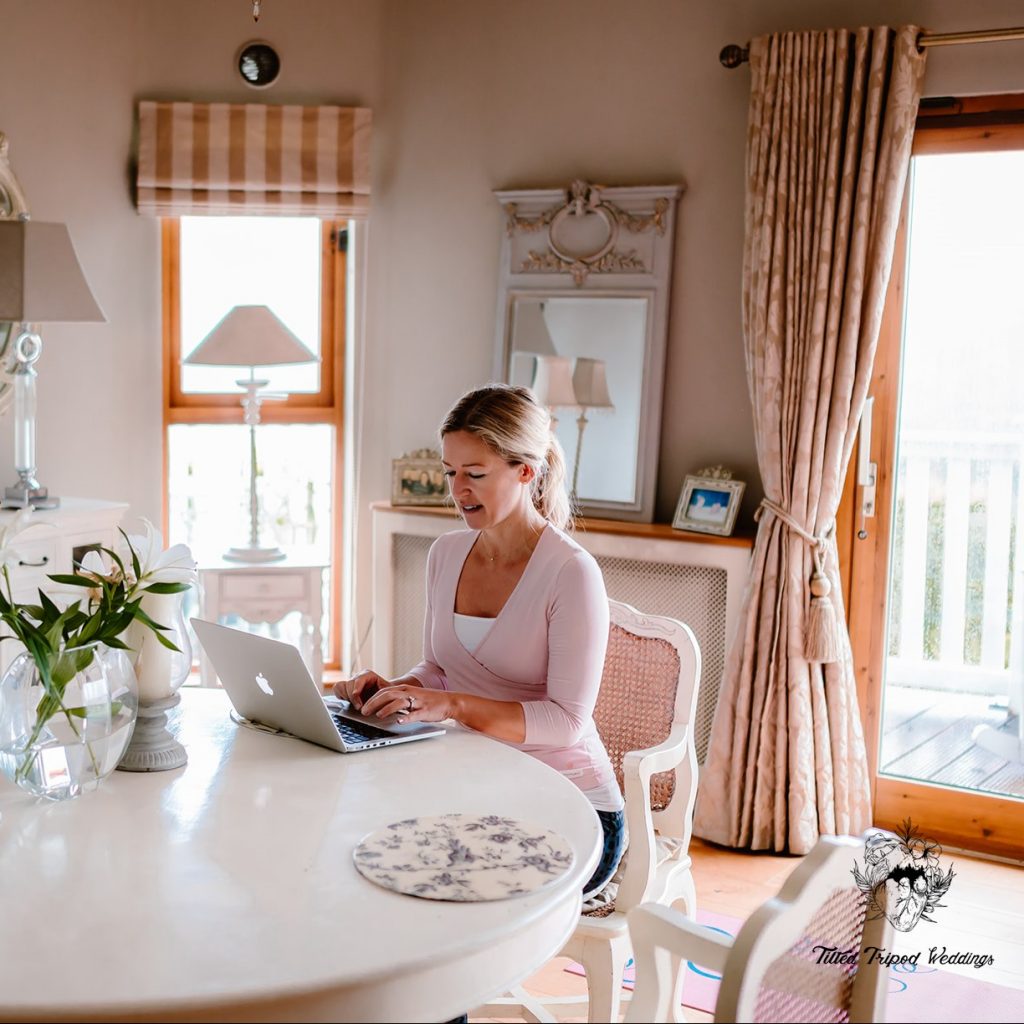 professional female working from home on laptop